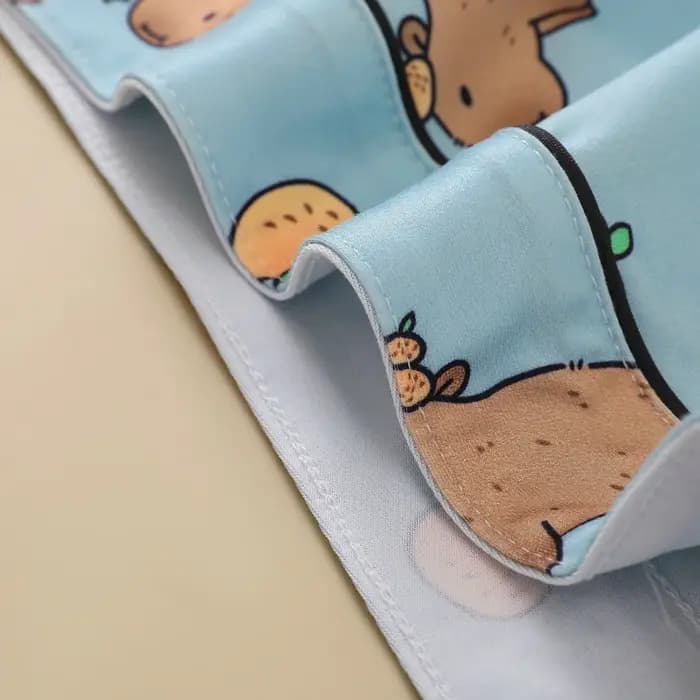 Pyjama sur le thème du Capybara bleu avec revers imprimé Animal