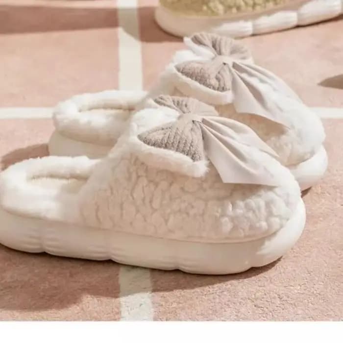 Pantoufles chaudes d'hiver en fourrure pour femmes, chaussures souples antidérapantes avec nœud mignon, confortables à talon plat, pantoufles d'intérieur en peluche pour chambre à coucher, 2025