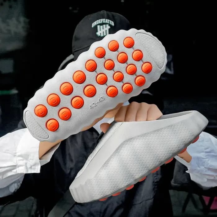 Chaussons de mode pour hommes et femmes avec massage par détection plantaire