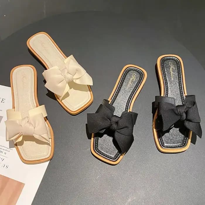 Pantoufles élégantes à semelle souple avec nœud papillon