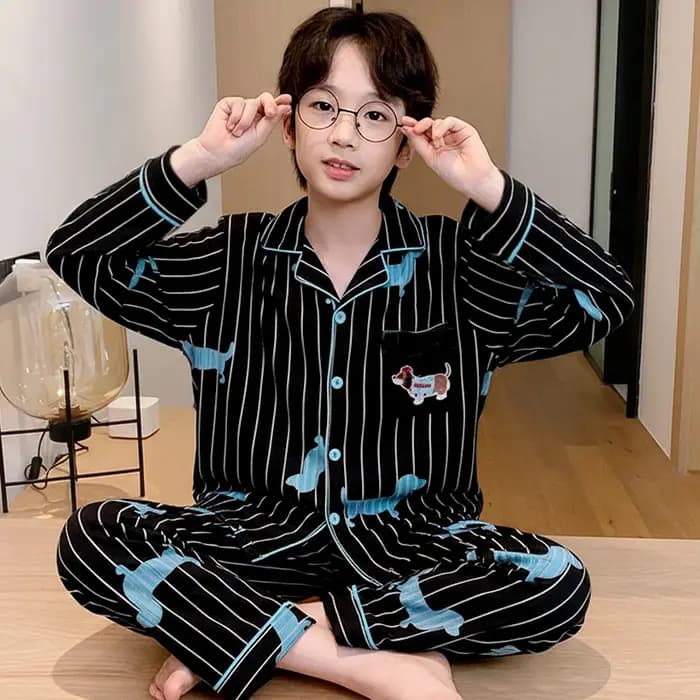 Ensemble de pyjama à motif de chiot, comprenant un haut à manches longues et un pantalon assorti, vêtement d'intérieur confortable.