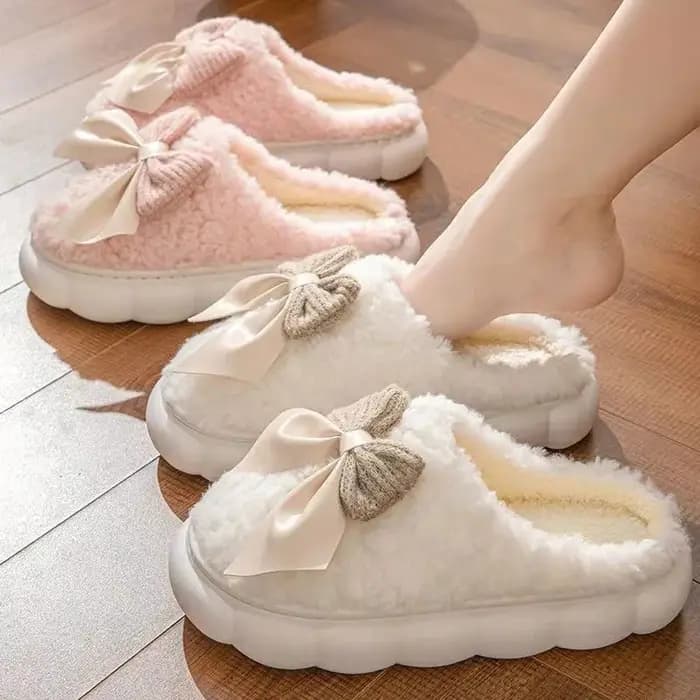Pantoufles chaudes d'hiver en fourrure pour femmes, chaussures souples antidérapantes avec nœud mignon, confortables à talon plat, pantoufles d'intérieur en peluche pour chambre à coucher, 2025